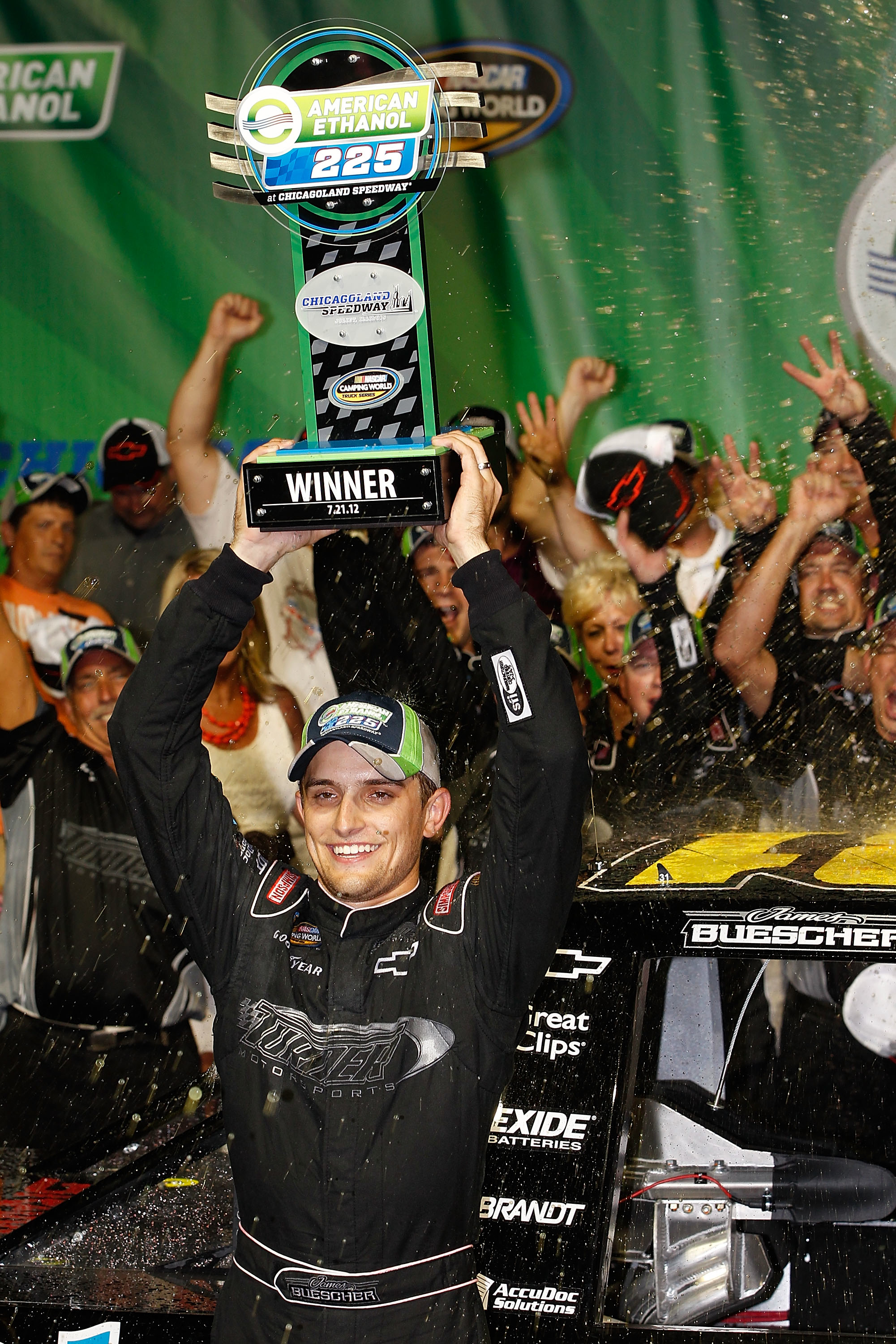 2012 Chicagoland Trucks James Buescher Celebrates With Trophy